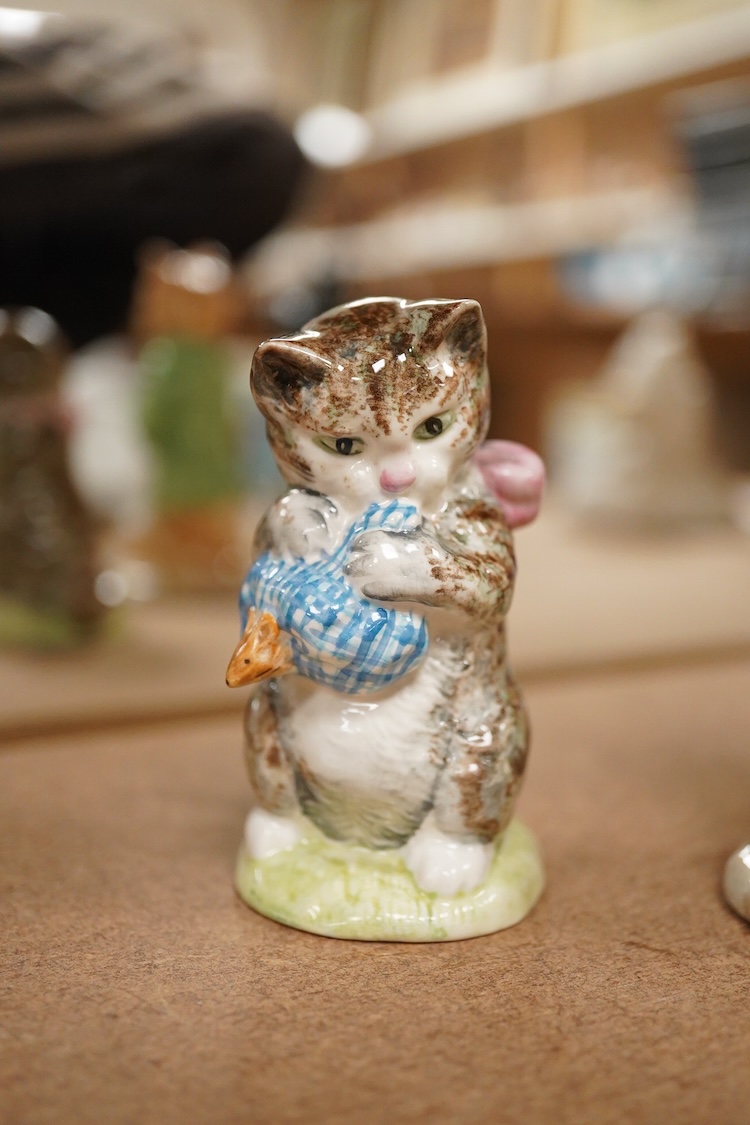 Four Beatrix Potter Beswick figures; Simpkin, Ginger, Miss Moppet and Pig-Wig, largest 10cm high